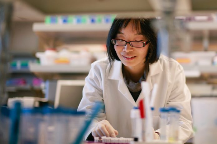 Female Scientist at a engineering lab