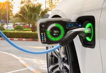 Electric vehicle changing on street parking with graphical user interface, Future EV car concept.