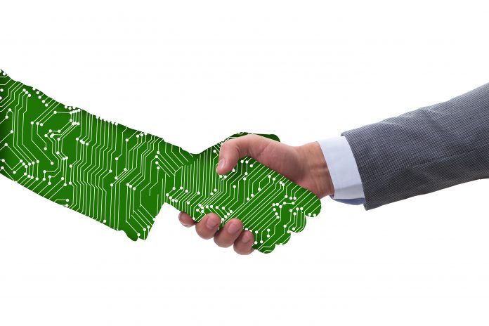 Digital transformation concept with the handshake