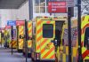 transport for the nhs - ambulances lined up outside hospital