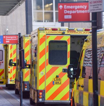 transport for the nhs - ambulances lined up outside hospital