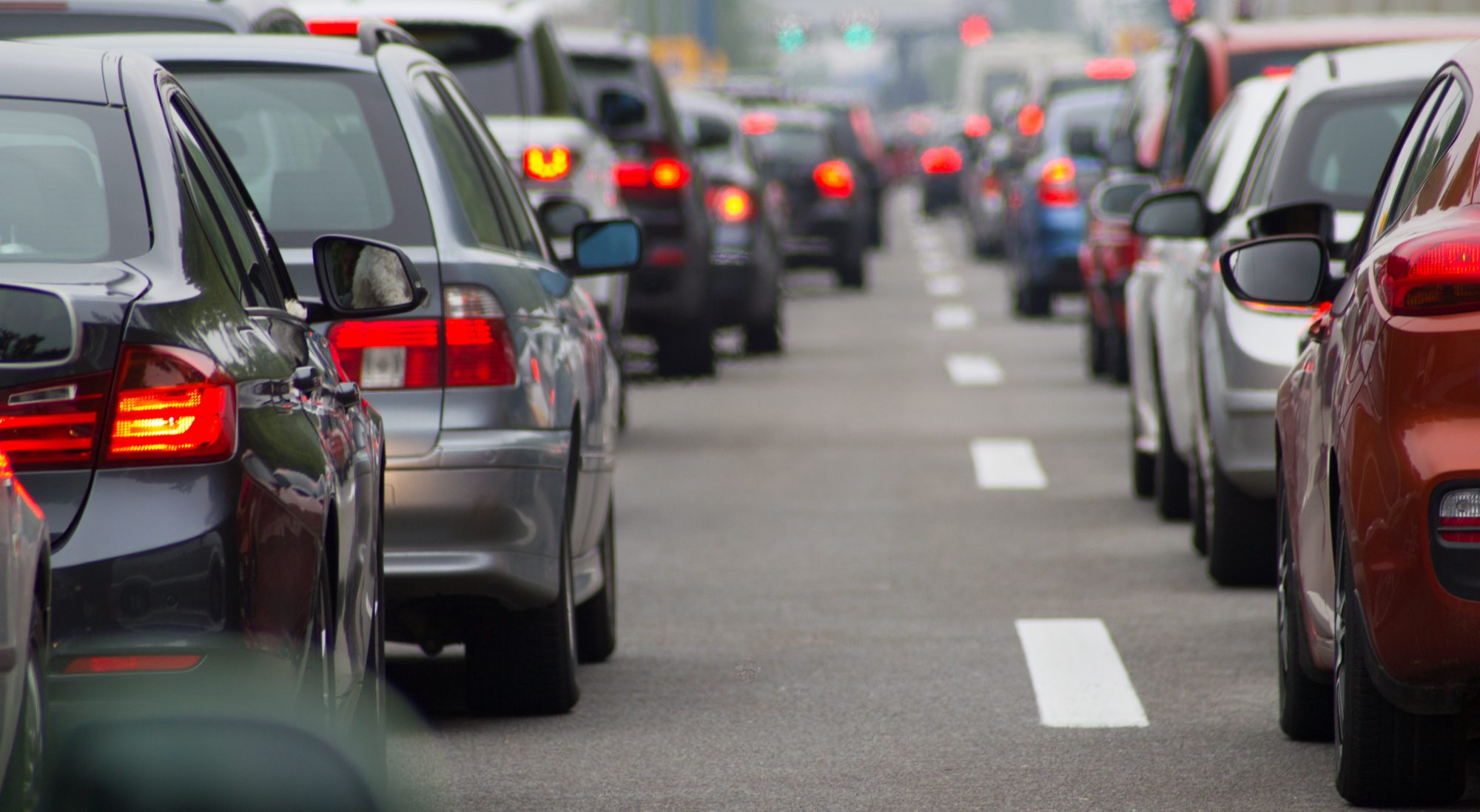 Cars lining up on motorway