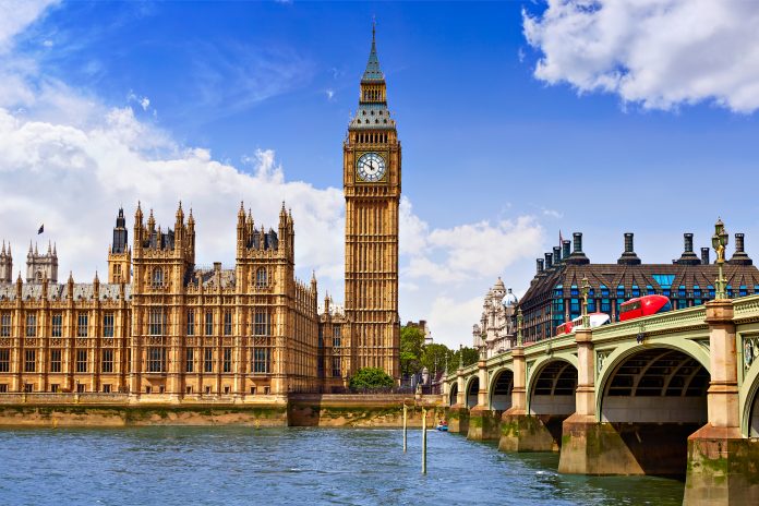 Big Ben London Clock tower in UK pictured by Thames river
