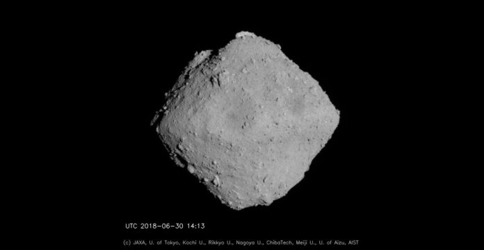The asteroid Ryugu, as seen by Japan's Hayabusa2 spacecraft on June 30, 2018. (Image credit: JAXA, University of Tokyo, Kochi University, Rikkyo University, Nagoya University, Chiba Institute of Technology, Meiji University, University of Aizu and AIST.)