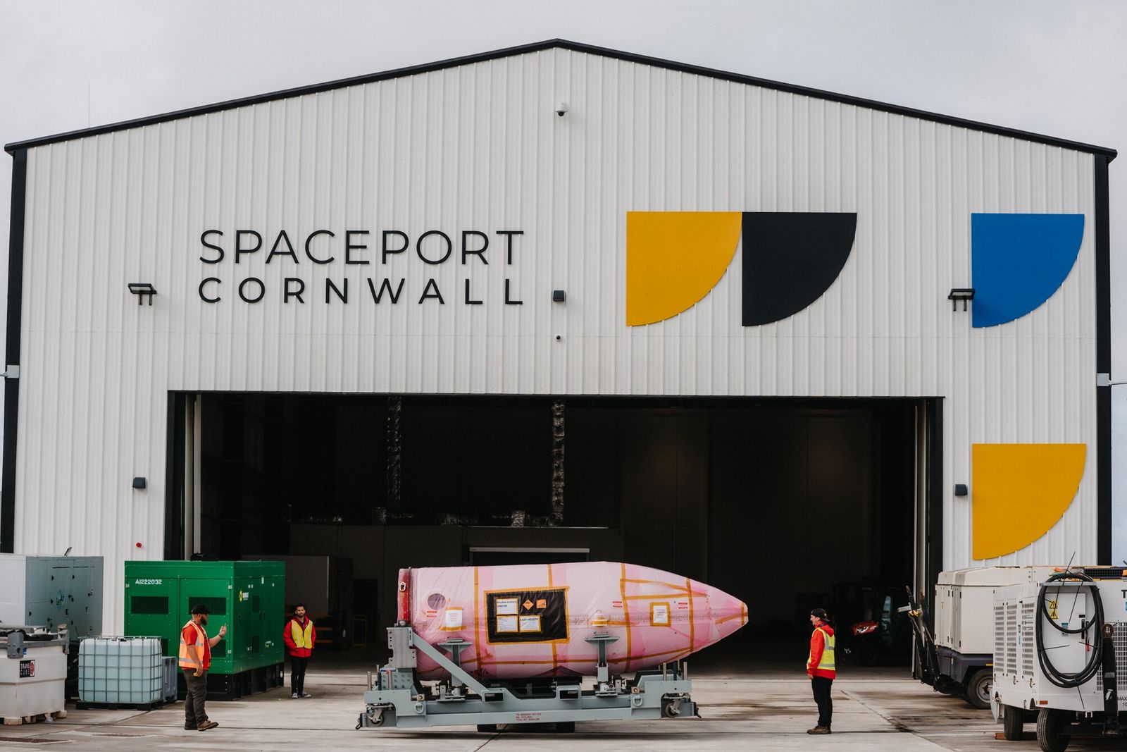 The nosecone of the Launcher One rocket is wheeled into SpacePort Cornwall's hangar at Newquay Airport, October 2022. The facility is set to be the first U.K. site to launch an orbital payload.