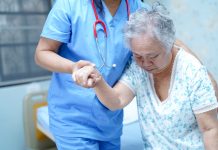 woman caring for an elderly woman