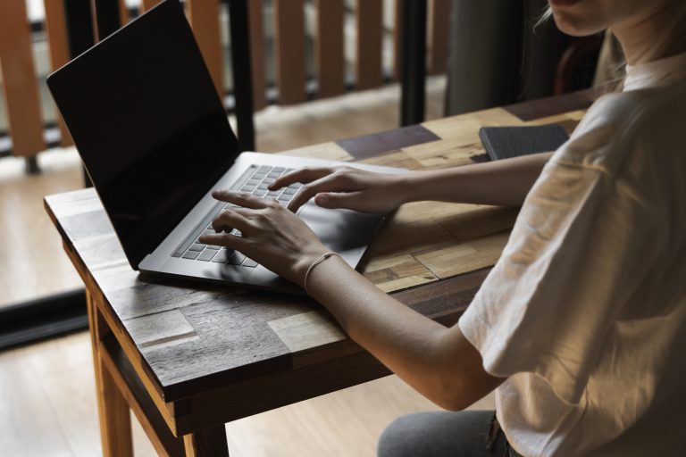 typing on laptop keyboard