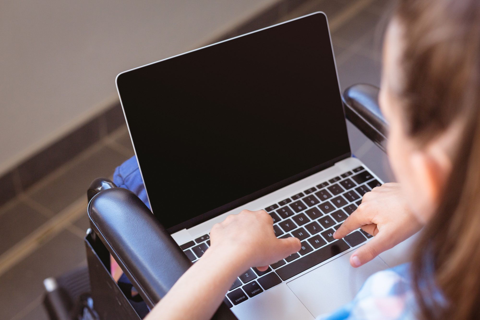 Disabled student using laptop