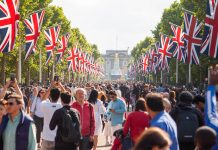 LONDON, ENGLAND- 2 June 2022: People gathered on the mall for the Queen`s Platinum Jubilee event in London