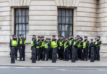 Police stand guard on Whitehall st