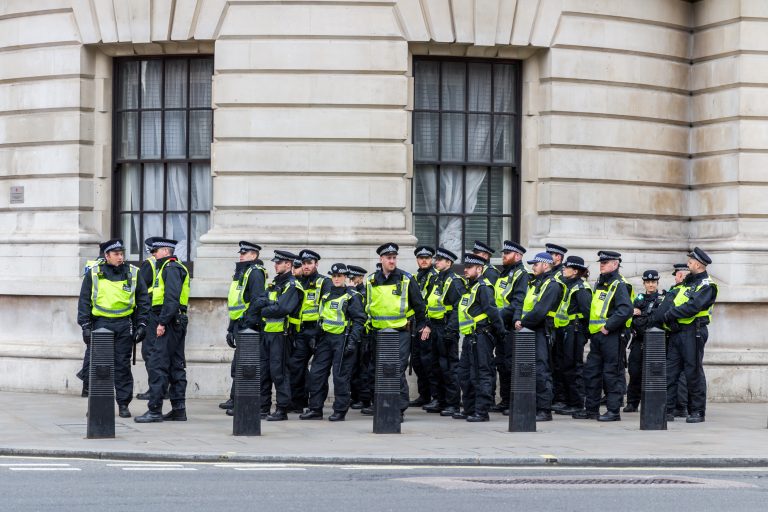 Police stand guard on Whitehall st