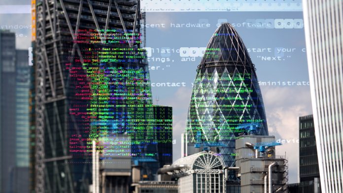 London city with data and computer programming information mapped over the skyline