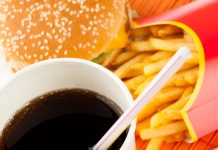 Close up of McDonald's burger, fries and fizzy drink