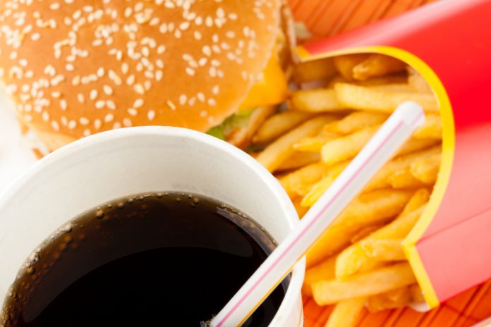 Close up of McDonald's burger, fries and fizzy drink