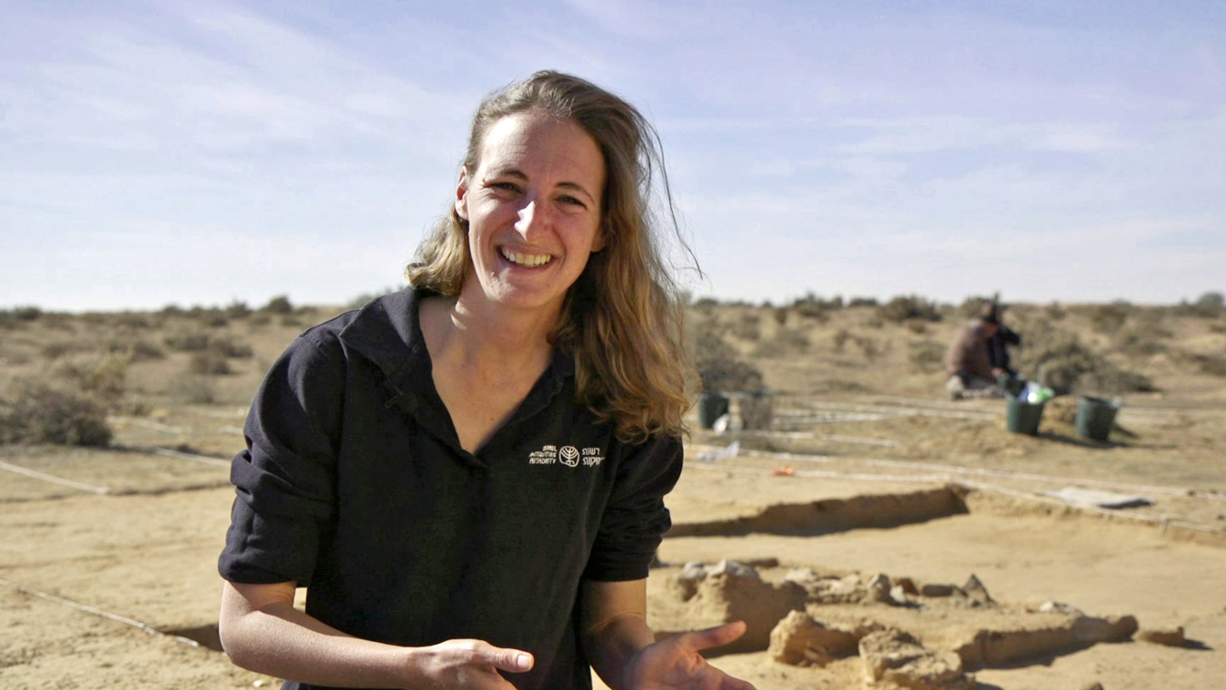 Lauren David, excavation director, stood in front of the archaeological site 