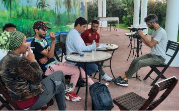 Al-houma dreams (Rabat-Salé, September 2022), young people sat around part of transgangs exploration into Mediation tools In gang research