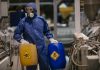 Man working with radwaste