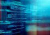 Government’s roadmap to achieving trusted data Studio shot of streams of binary code against a dark background