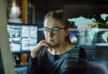 woman on computer looking at data