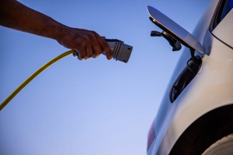 Plugging in electric car for charging