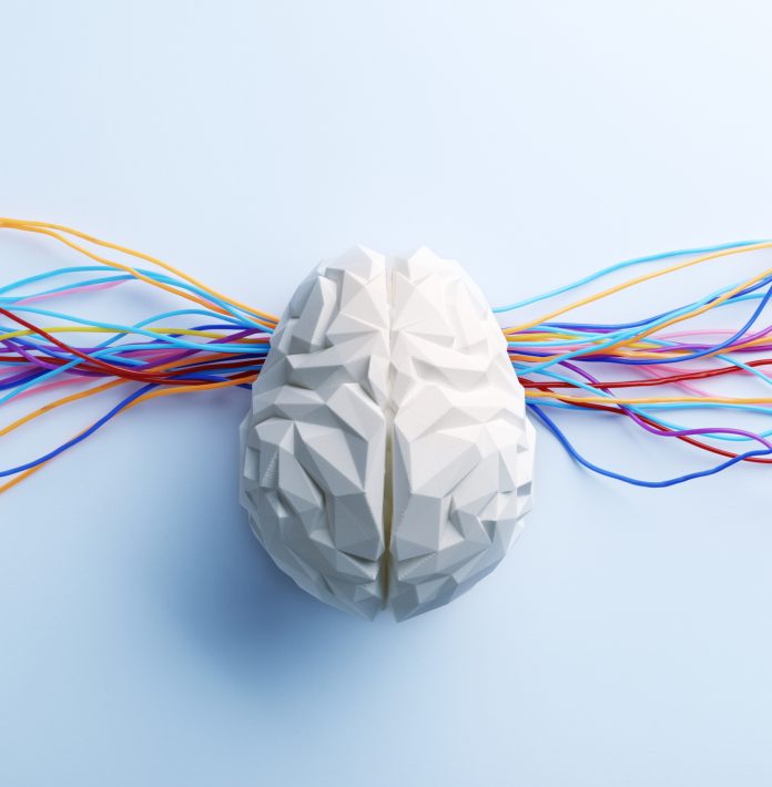 Artificial brain with colorful cables.