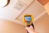 Infrared Thermal Imaging Camera Pointing to Attic