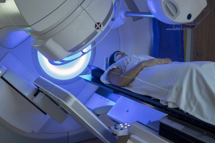woman receiving radiotherapy for cancer