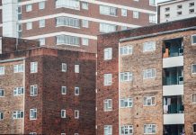 Facades of different apartment buildings in London