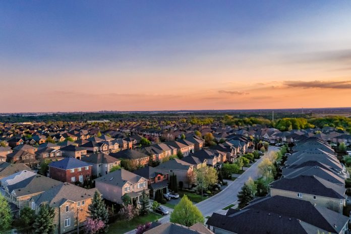 housing complex with a sunset background