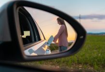 Electric car charge in a rear mirror