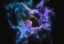 Explosion of colored powder on black background