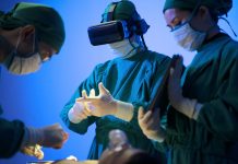 Doctors are surgery to patient at operating room. Using virtual reality glasses. Medical and health care concept.