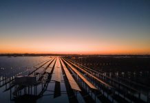 Early in the morning, the photovoltaic power station by the sea