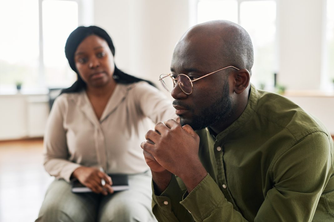 middle aged black man having therapy