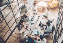 group of people working together in an office