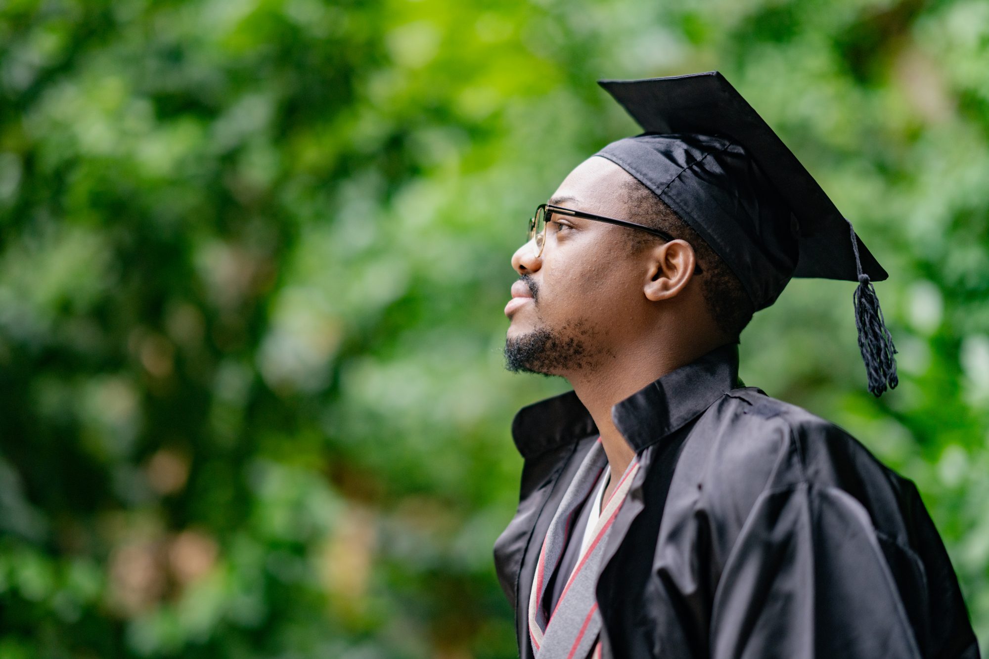 student celebrating his graduation