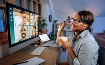 businesswoman having video call while working from home office