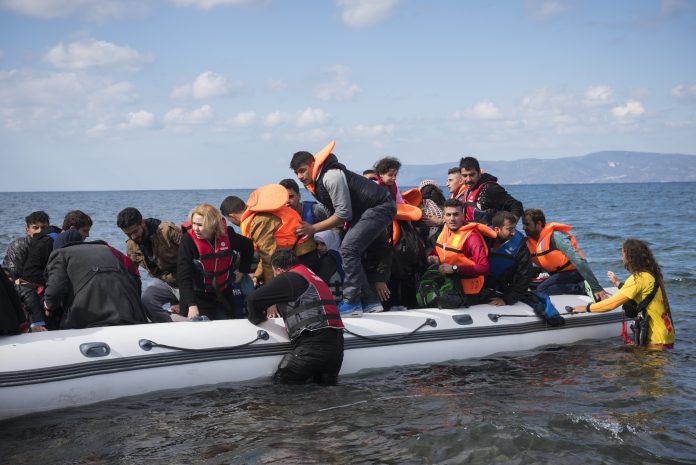 Refugee boat arriving on Lesbos Greece