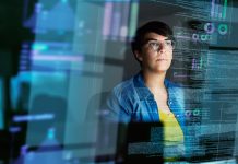 Cropped shot of a young computer programmer looking through data