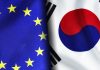 European union and South Korean flags standing side by side