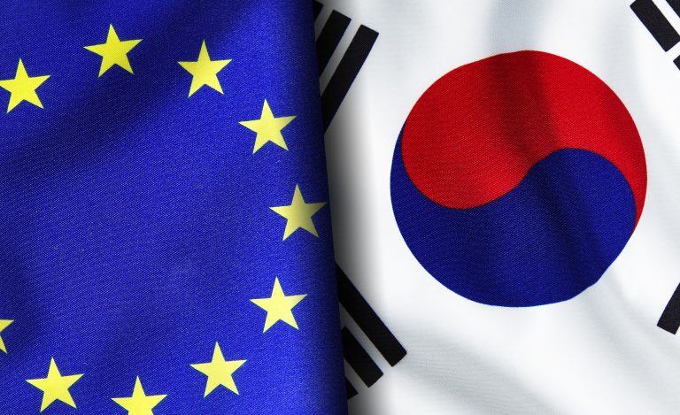 European union and South Korean flags standing side by side