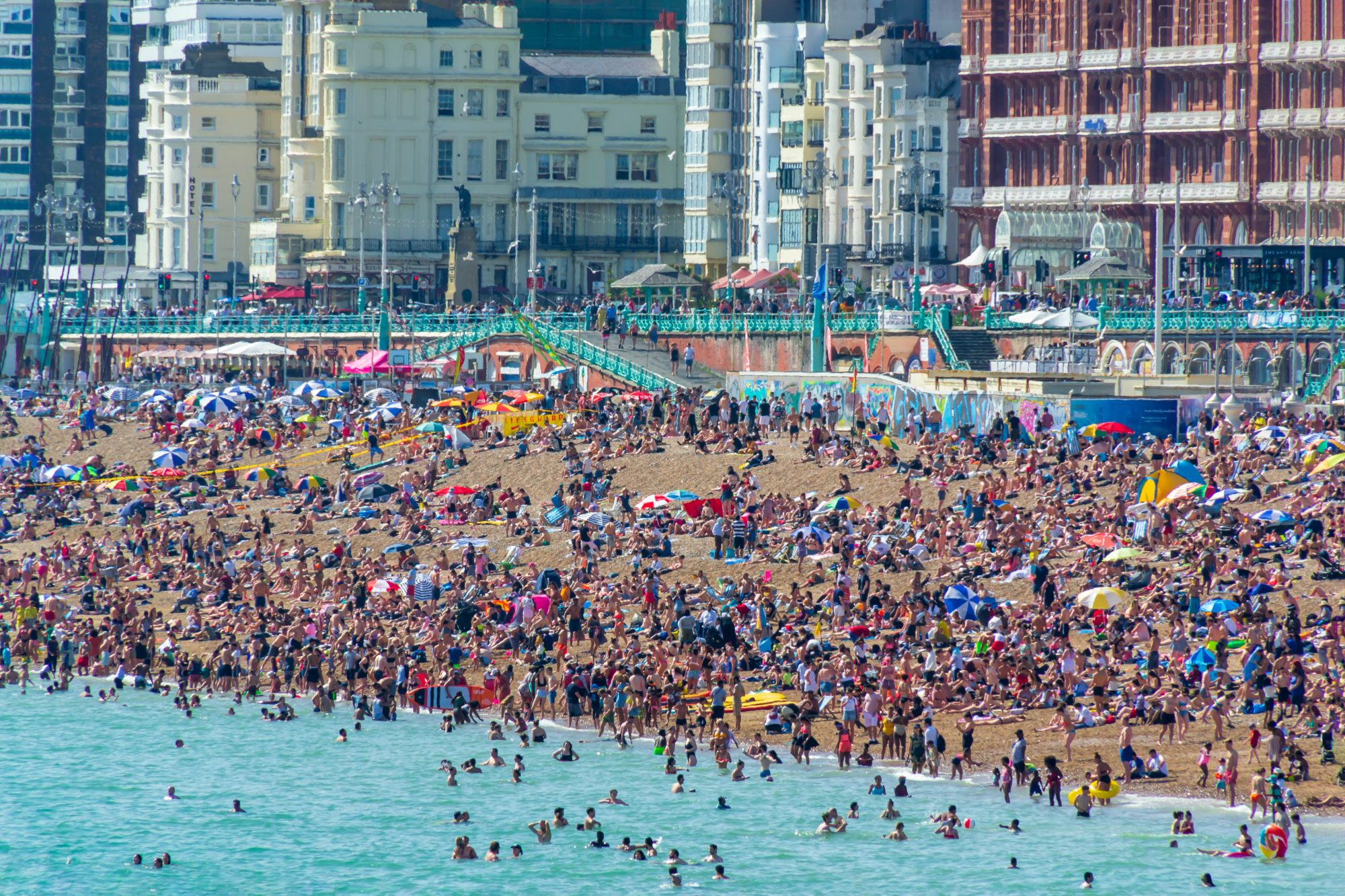 UK June 29th, 2019 Brighton beach, Brighton and Hove, East Sussex, England. Thousands of people relax on the sun.b