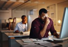 man at his workplace with a lot of stress