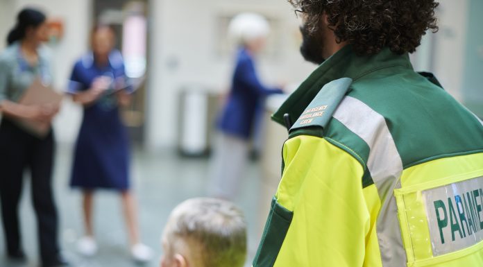 paramedic bringing patient to hospital