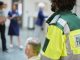 paramedic bringing patient to hospital