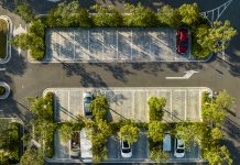 Aerial view of the parking lot in the urban green belt