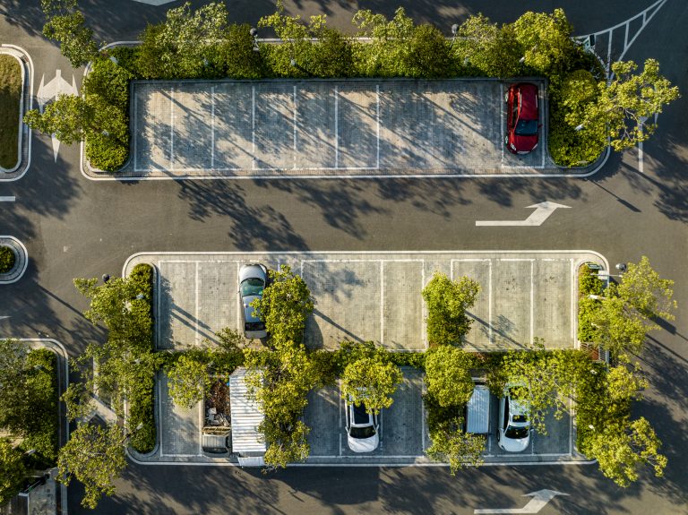 Aerial view of the parking lot in the urban green belt
