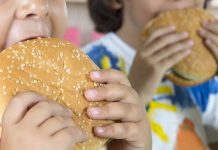 Boy And Girl With Hamburgers. "the t-shirt painted by himself"