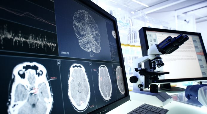 Futuristic laboratory equipment. Brainwave scanning research on computer screens