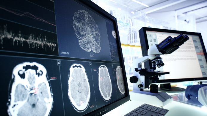 Futuristic laboratory equipment. Brainwave scanning research on computer screens